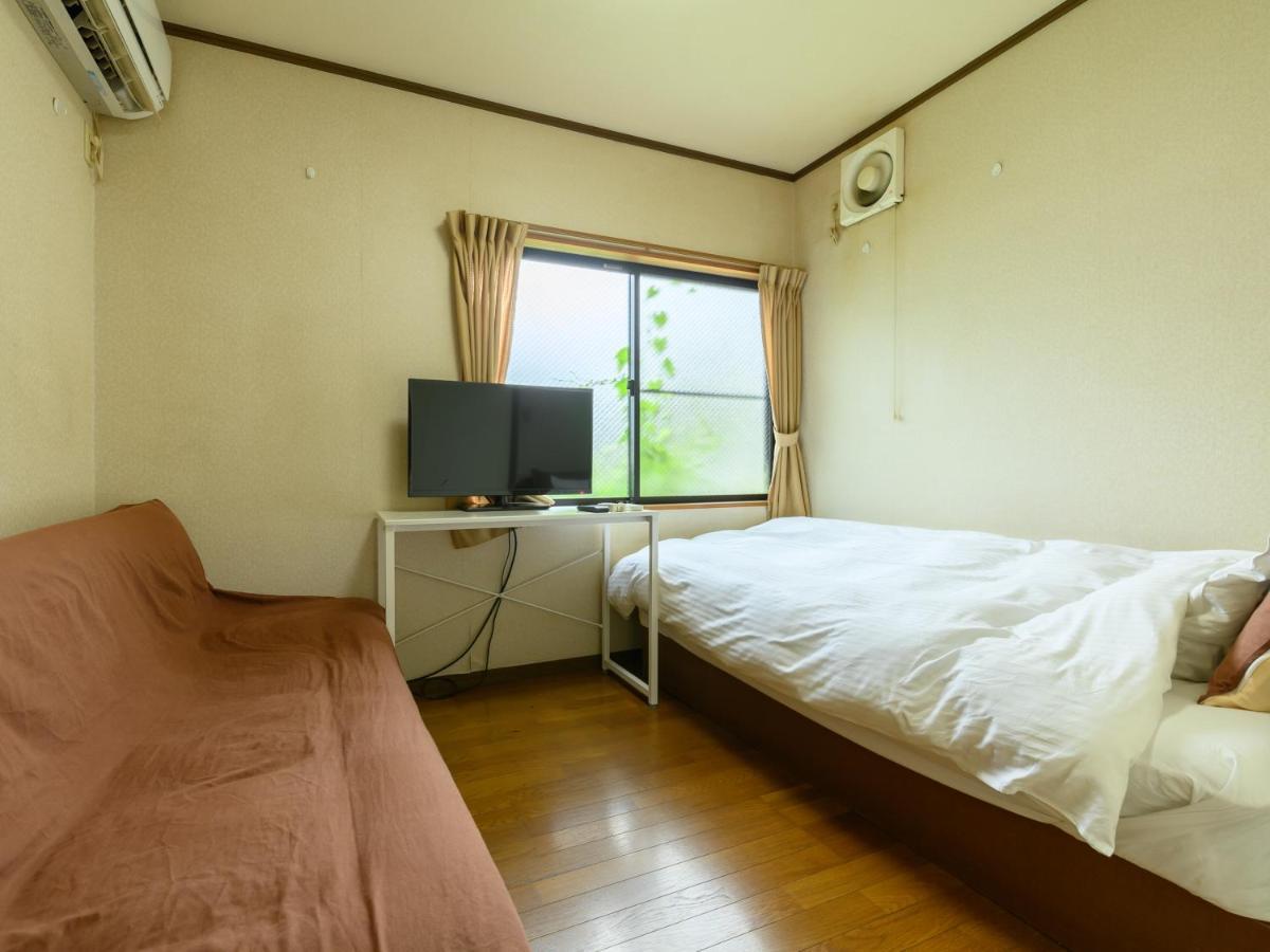 Tabist Tatsumi Business Hotel Мацусака Экстерьер фото