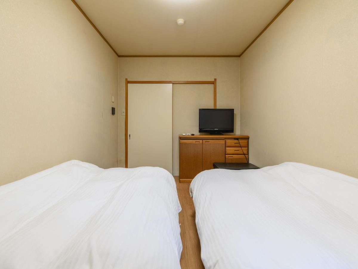 Tabist Tatsumi Business Hotel Мацусака Экстерьер фото