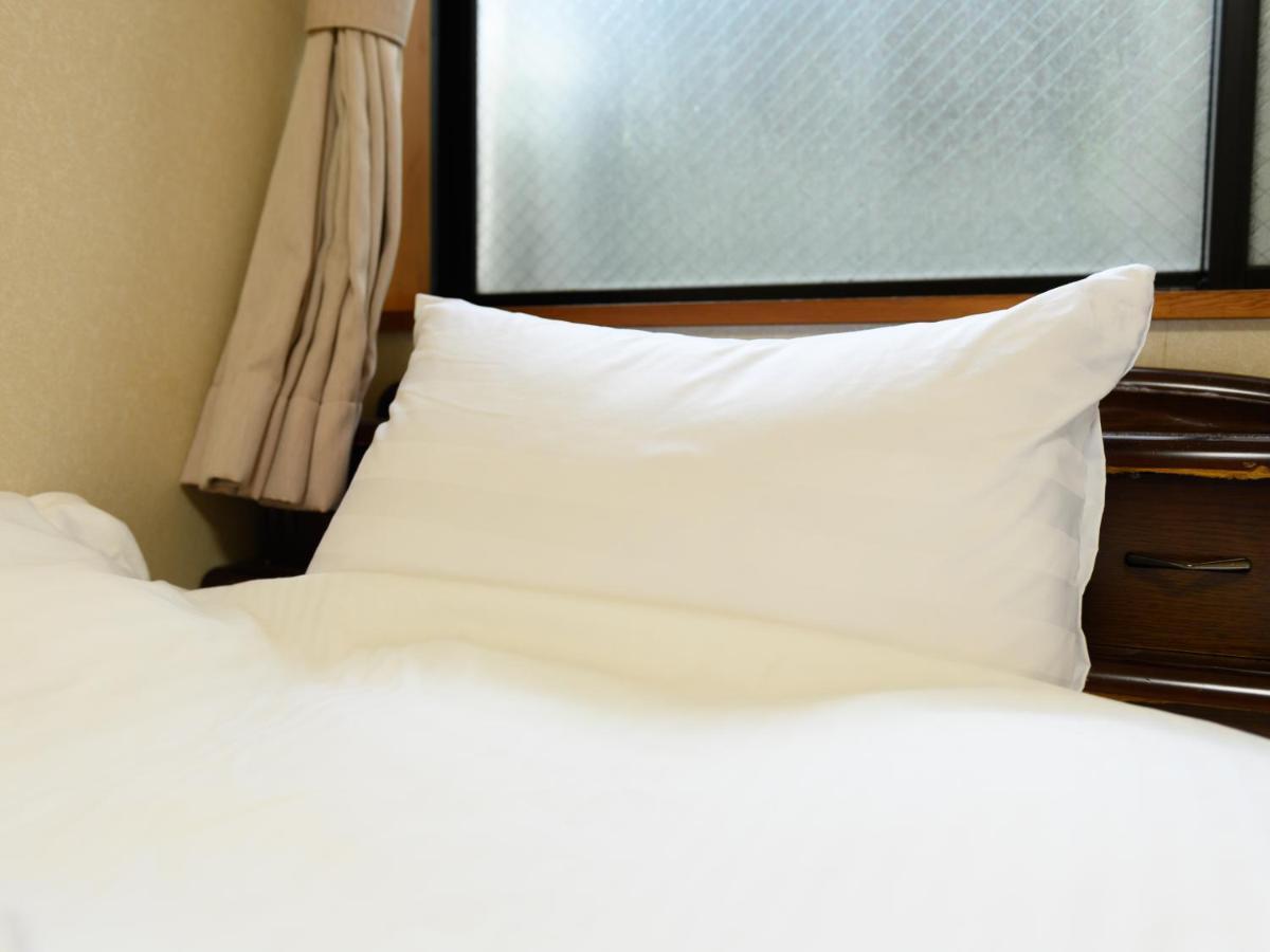 Tabist Tatsumi Business Hotel Мацусака Экстерьер фото