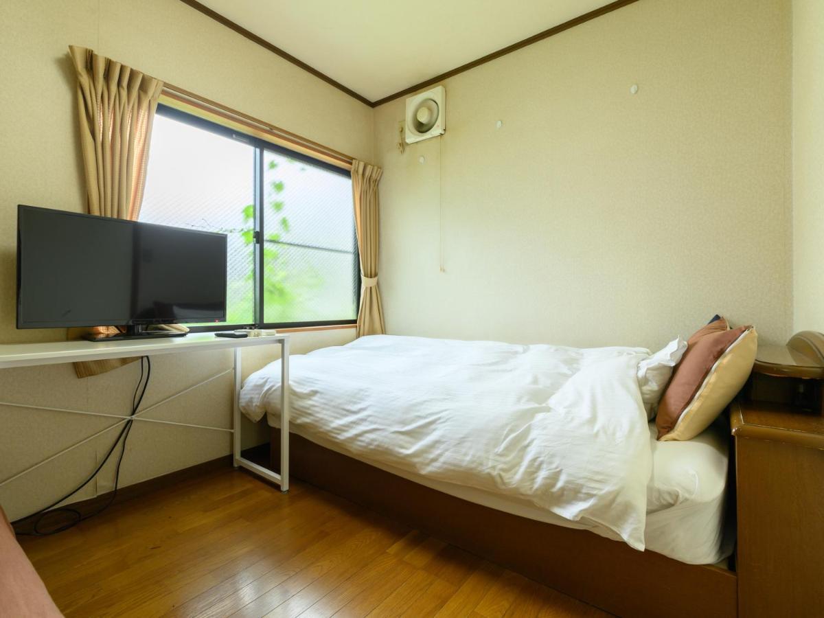 Tabist Tatsumi Business Hotel Мацусака Экстерьер фото