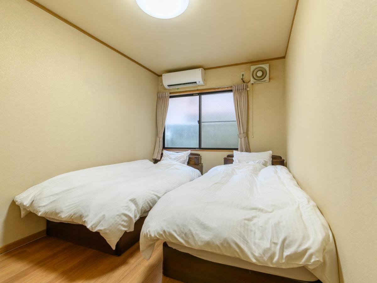 Tabist Tatsumi Business Hotel Мацусака Экстерьер фото