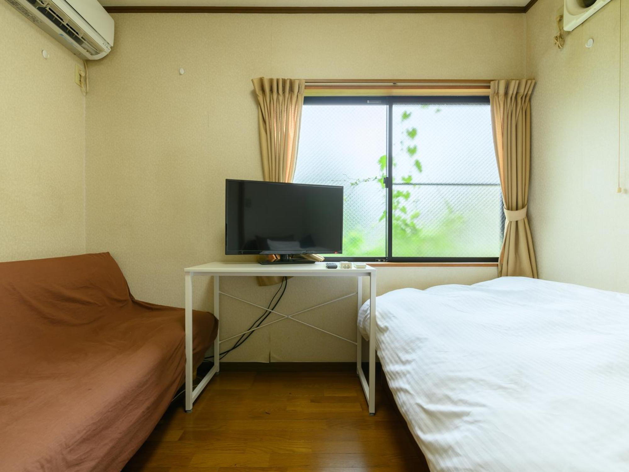 Tabist Tatsumi Business Hotel Мацусака Экстерьер фото