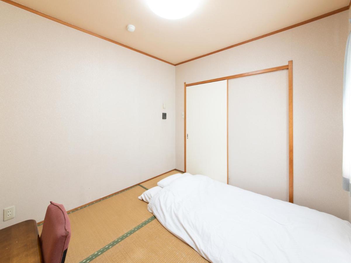 Tabist Tatsumi Business Hotel Мацусака Экстерьер фото