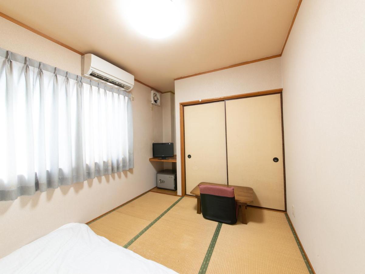 Tabist Tatsumi Business Hotel Мацусака Экстерьер фото